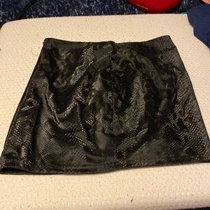 Black fake leather mini skirt